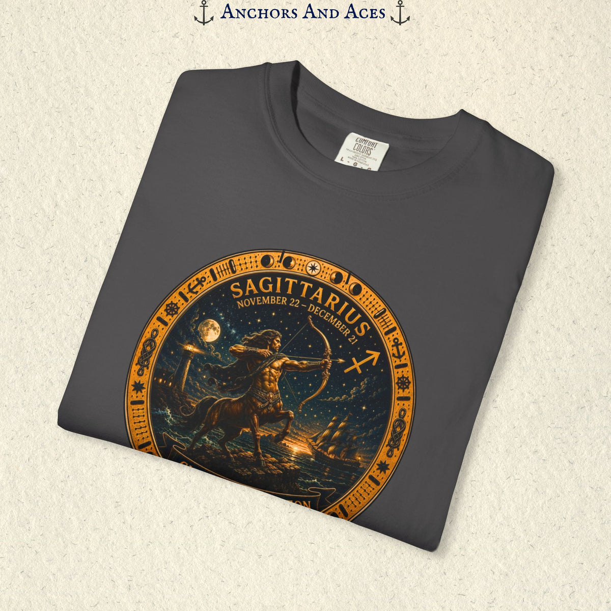 Folded Sagittarius Zodiac Shirt close-up featuring the full circular Sagittarius medallion and star-filled artwork.