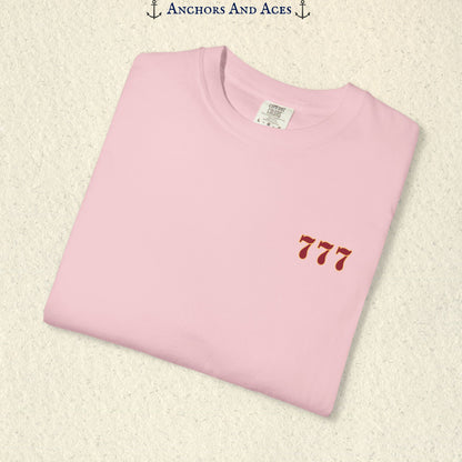 Folded Blossom Lucky 777s T-shirt showing the small red 777 casino emblem on the front chest.