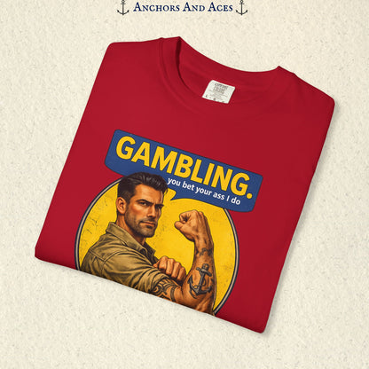 Folded Red funny gambling T-shirt showing the retro strongman flexing beneath bold GAMBLING text.