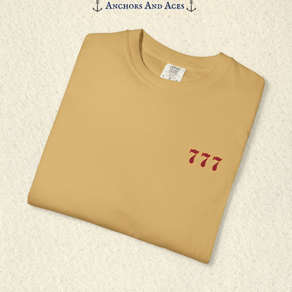 Folded Mustard Lucky 777s T-shirt showing the small red 777 casino emblem on the front chest.