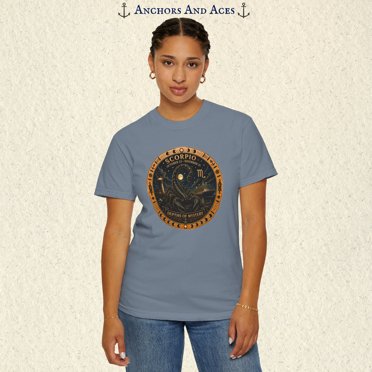 Male model wearing Scorpio zodiac shirt with scorpion celestial medallion front graphic