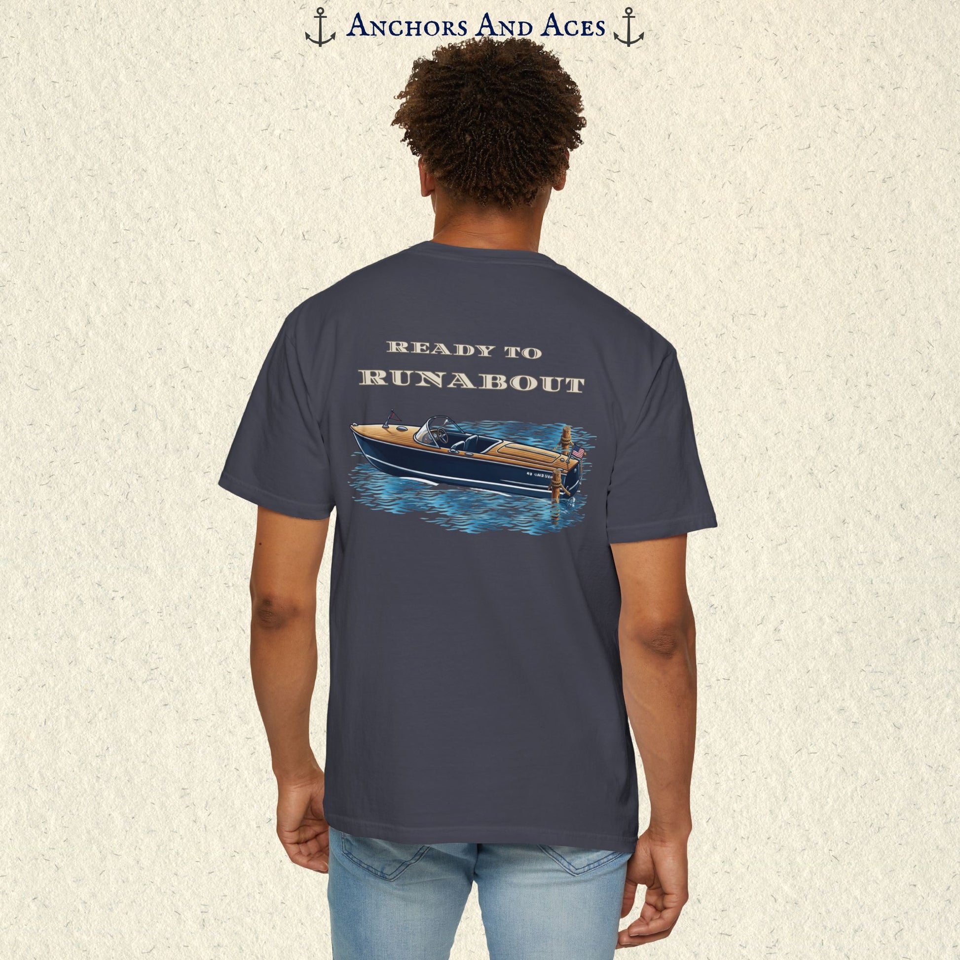 Model wearing a Navy classic wooden boat T-shirt from the back, featuring a vintage runabout on reflective blue water with Ready to Runabout text.