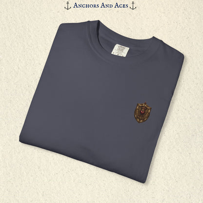 Folded House of Hearts graphic tee showing the small heraldic crest emblem on the front chest.