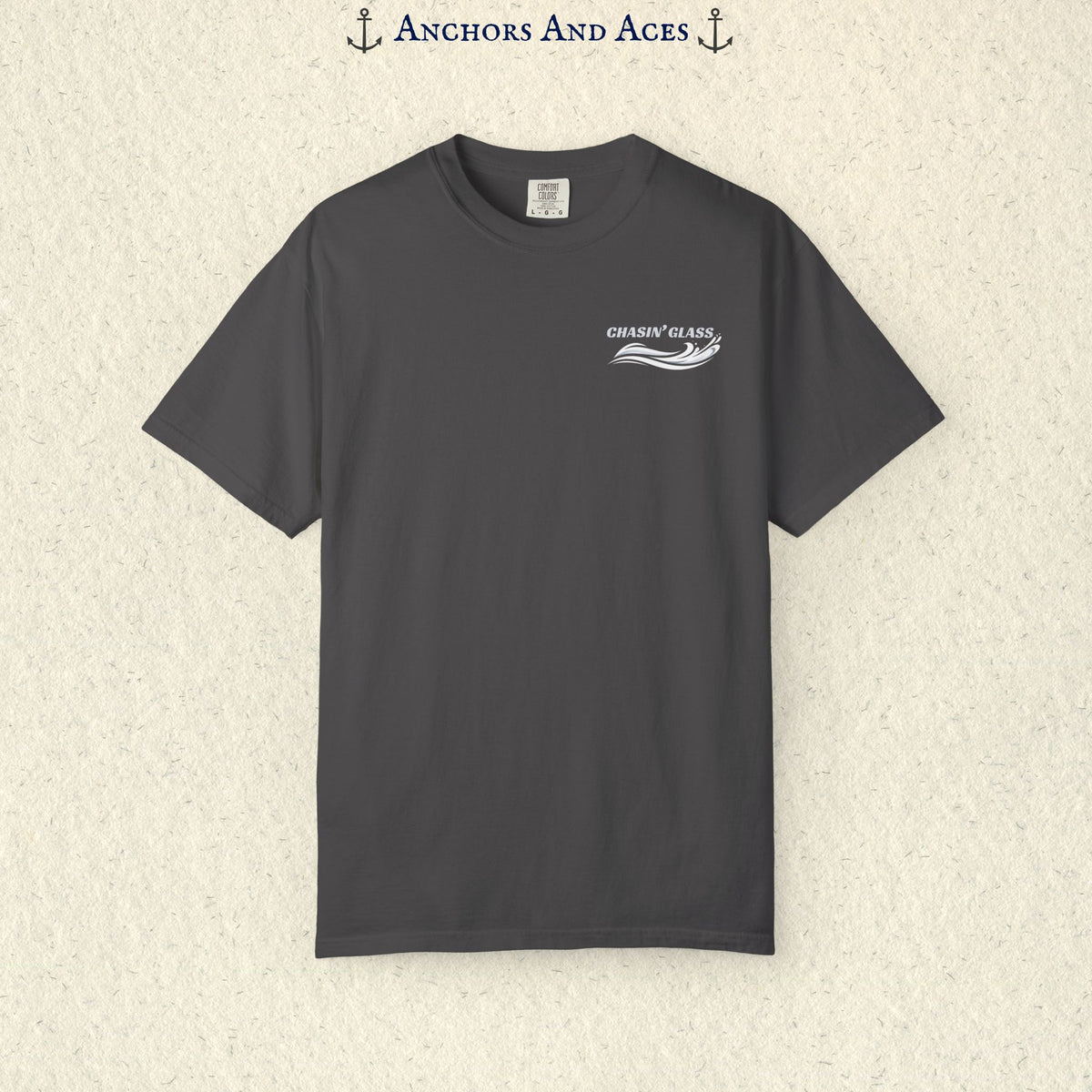 Graphite Comfort Colors 1717 water ski shirt shown from the front with the small white Chasin' Glass water splash logo on the left chest.
