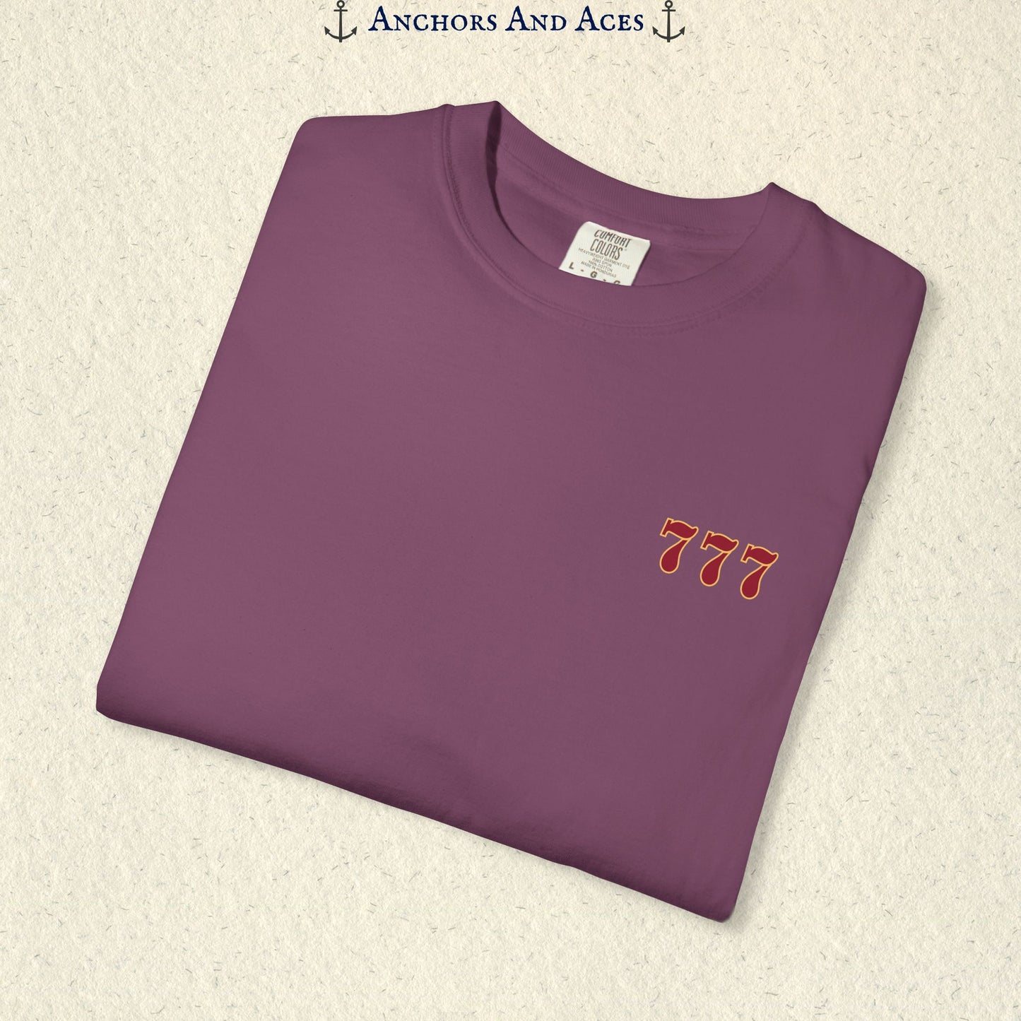 Folded Berry Lucky 777s T-shirt showing the small red 777 casino emblem on the front chest.