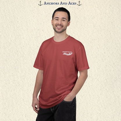 Model wearing a Crimson Comfort Colors 1717 water ski t-shirt from the front, showing the small white Chasin' Glass water-splash logo on the left chest.
