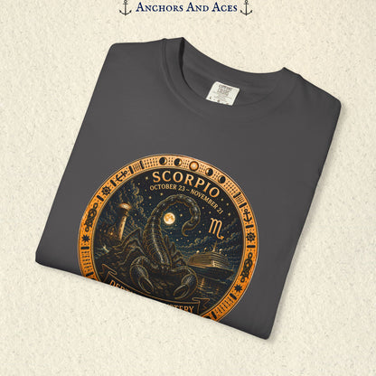 Folded Scorpio zodiac shirt close-up showing scorpion celestial medallion and Depths of Mystery artwork