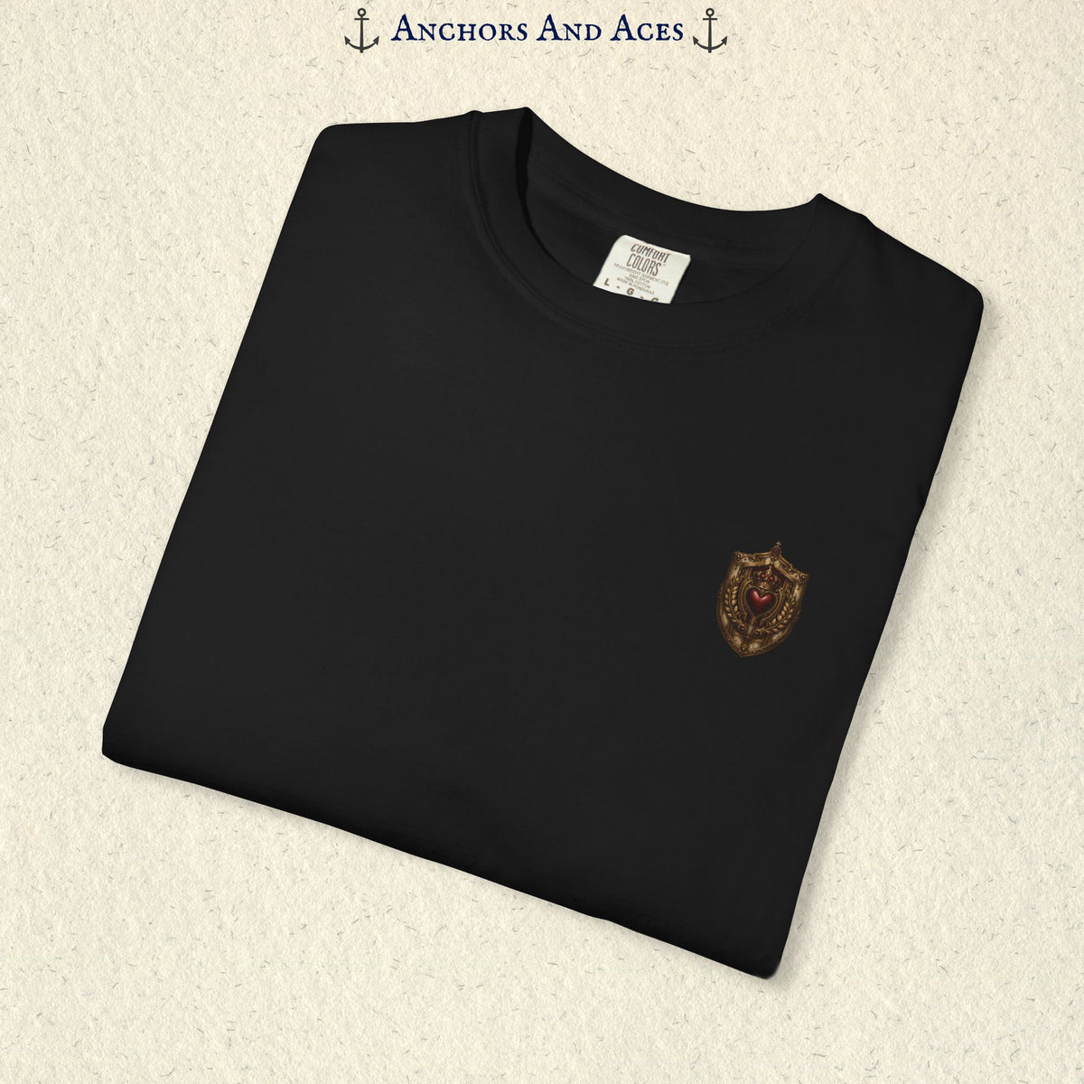 Folded House of Hearts playing card shirt showing the small coordinating House crest emblem on the front.