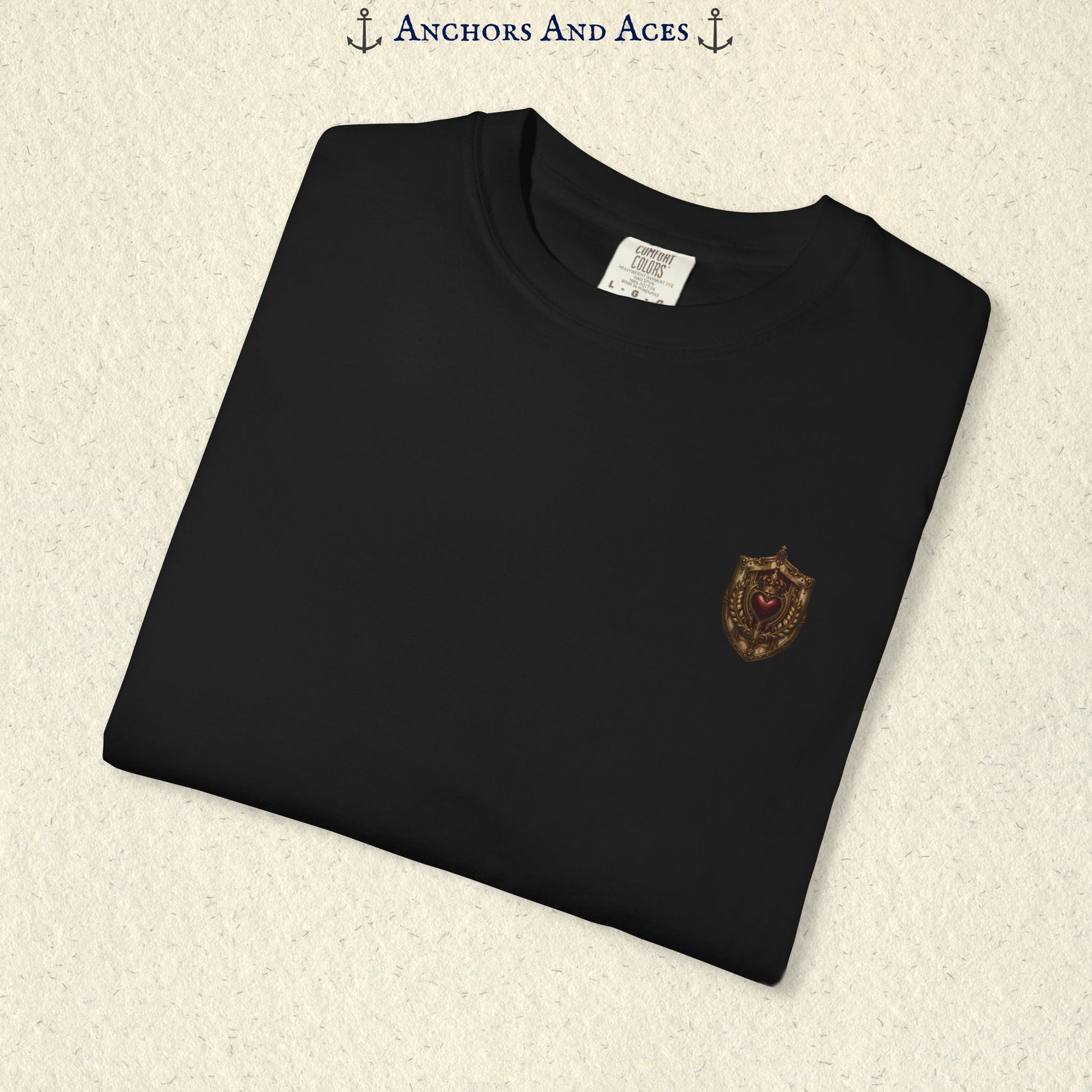 Folded House of Hearts playing card shirt showing the small coordinating House crest emblem on the front.